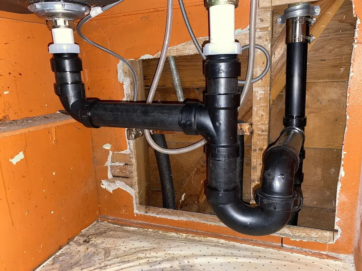 Professional Garbage Disposal Repair equipment and tools on the job in Tarboro